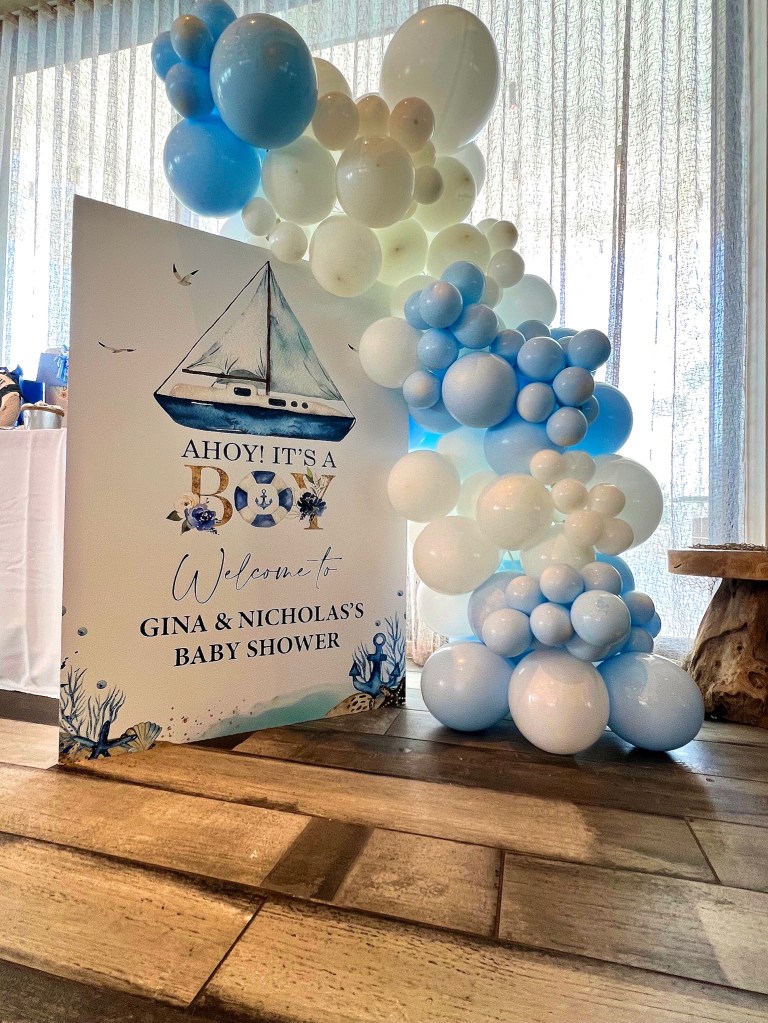 Nautical Baby boy baby shower themed. Backdrop custom graphic panels with custom pale blue balloon garlands. Picture perfect! 