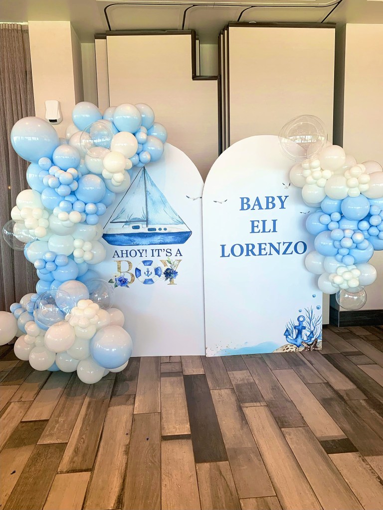 Nautical Baby boy baby shower themed. Backdrop custom graphic panels with custom pale blue balloon garlands. Picture perfect! 